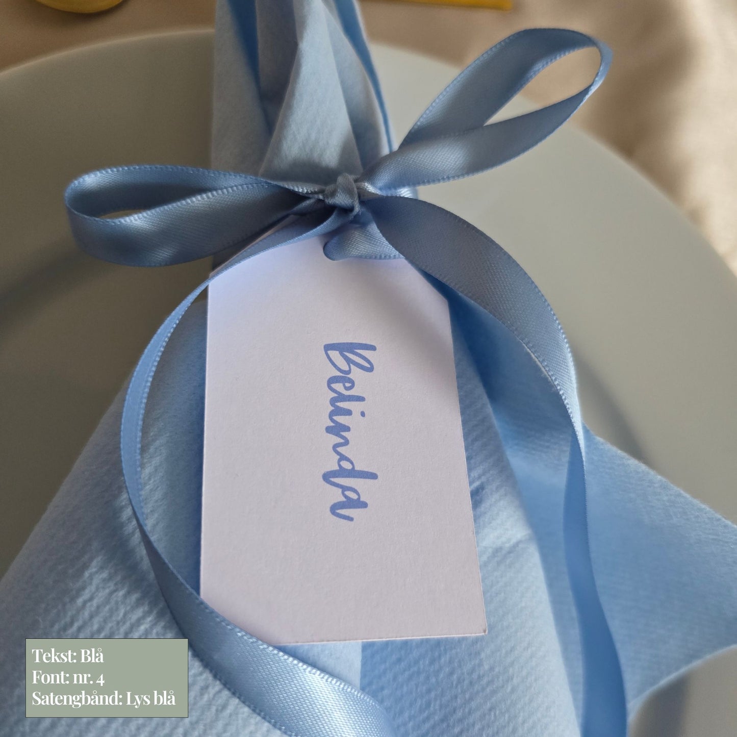 Serviettag med blått bånd