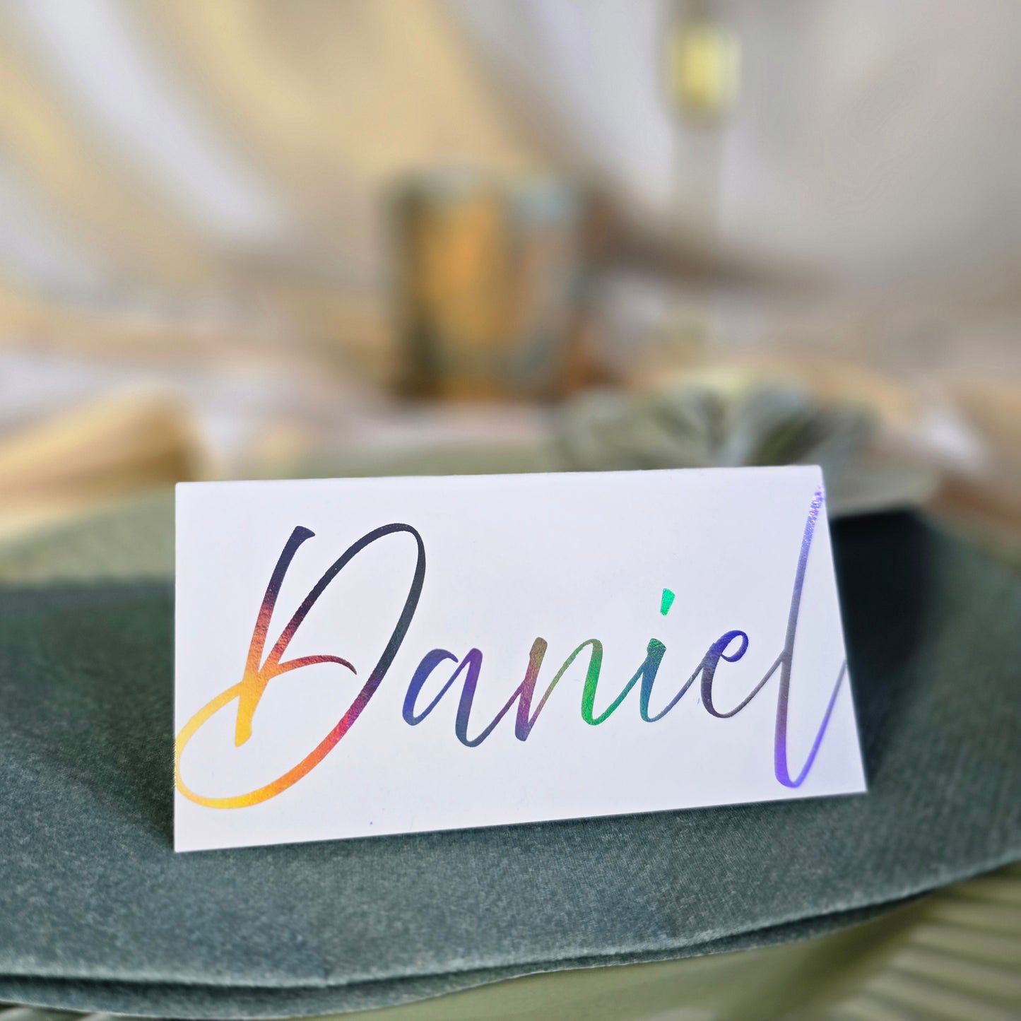 Bordkort med navn i skinnende folie