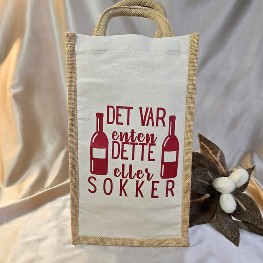 Vinpose med motivet "det var enten dette eller sokker" i rødt.