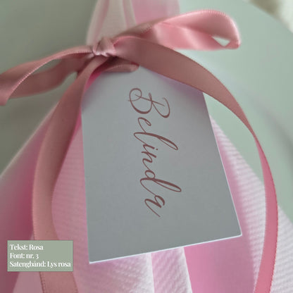 Serviettag med rosa bånd