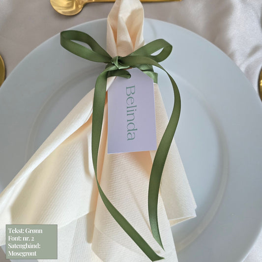 Serviettag med grønt bånd